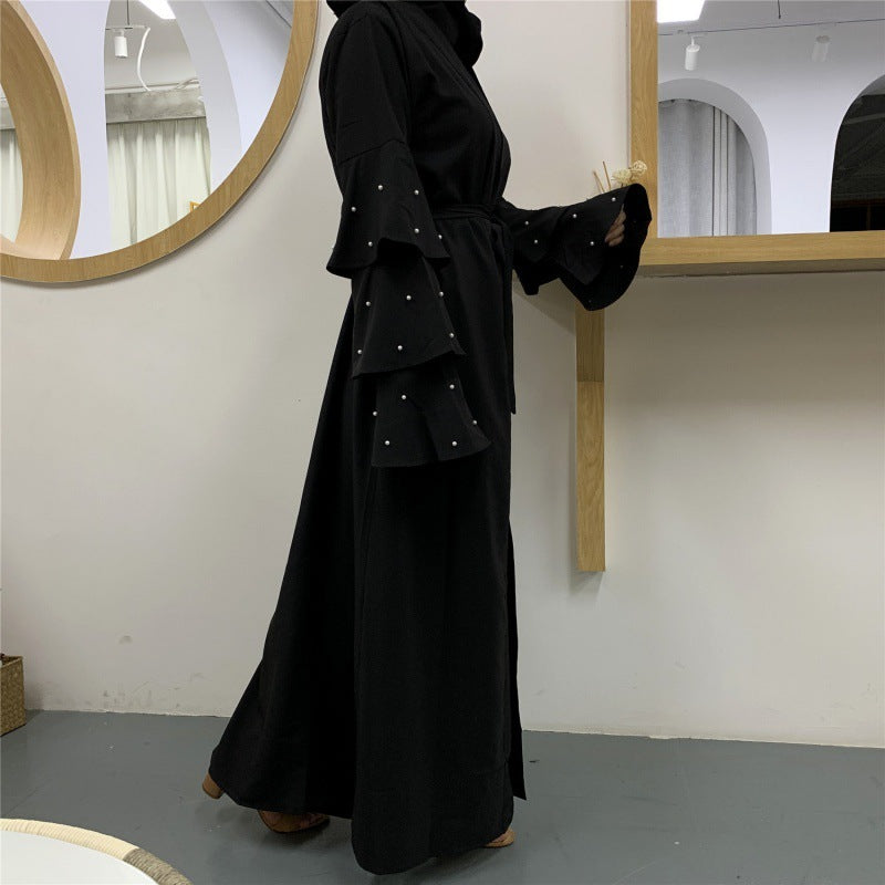 Cardigan à Manches Bouffantes et Perles – Élégance Contemporaine