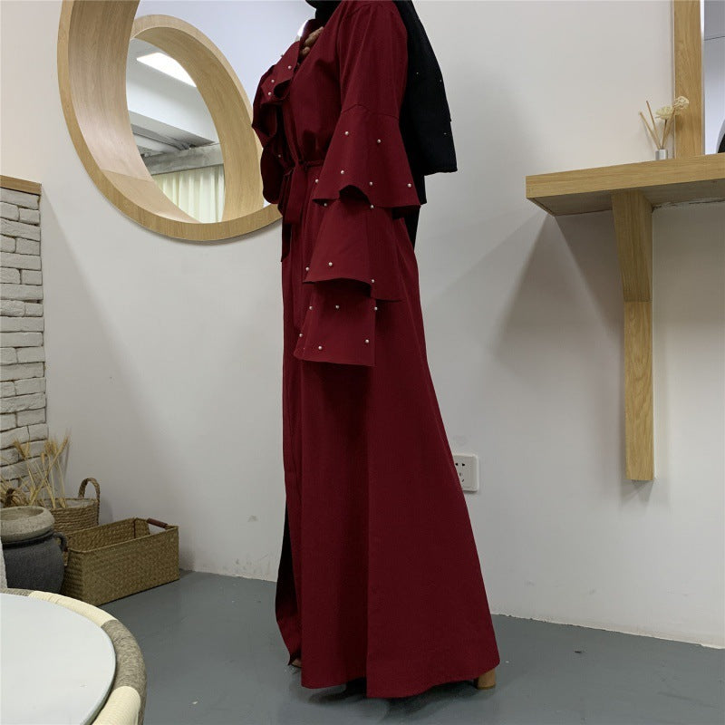 Cardigan à Manches Bouffantes et Perles – Élégance Contemporaine