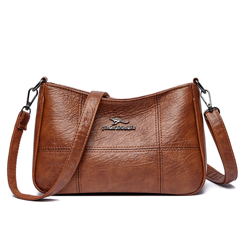 Sac à Bandoulière en Peau de Mouton – Élégance Artisanale