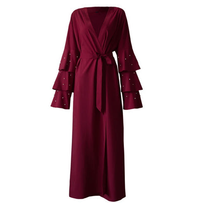 Cardigan à Manches Bouffantes et Perles – Élégance Contemporaine