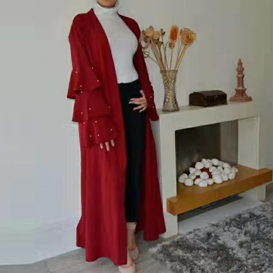 Cardigan à Manches Bouffantes et Perles – Élégance Contemporaine