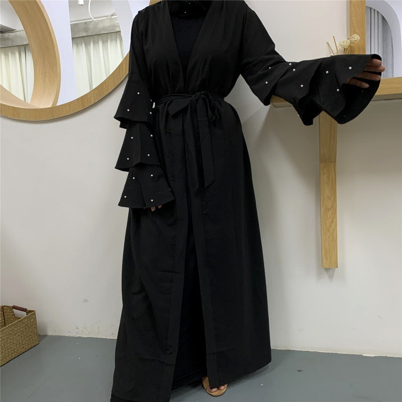 Cardigan à Manches Bouffantes et Perles – Élégance Contemporaine